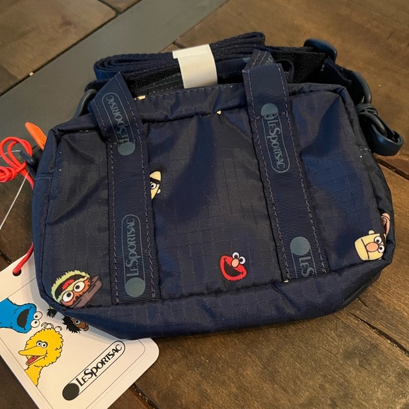 Lesportsac Handbags - NWT LeSportsac Sesame Street Crossbody Box Belt Bag!